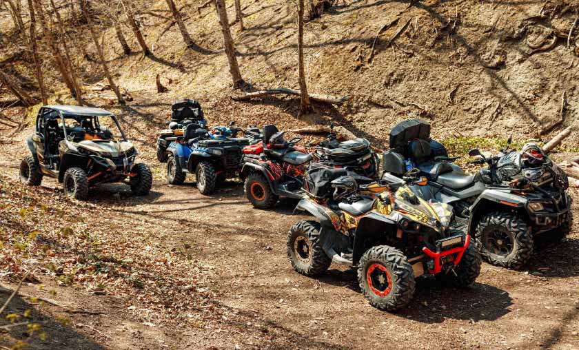 ATVs on dirt path